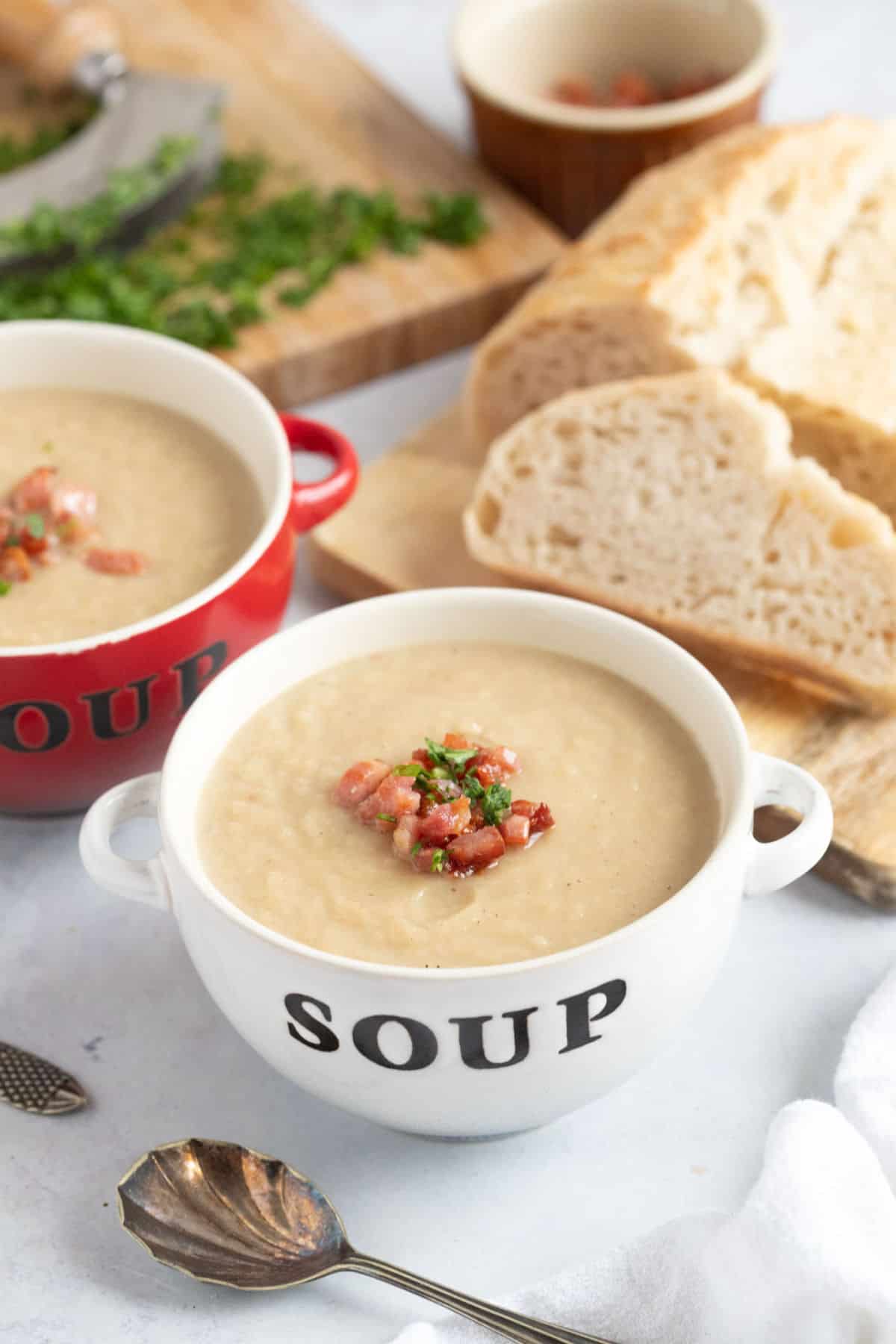 Celeriac soup in a white bowl.