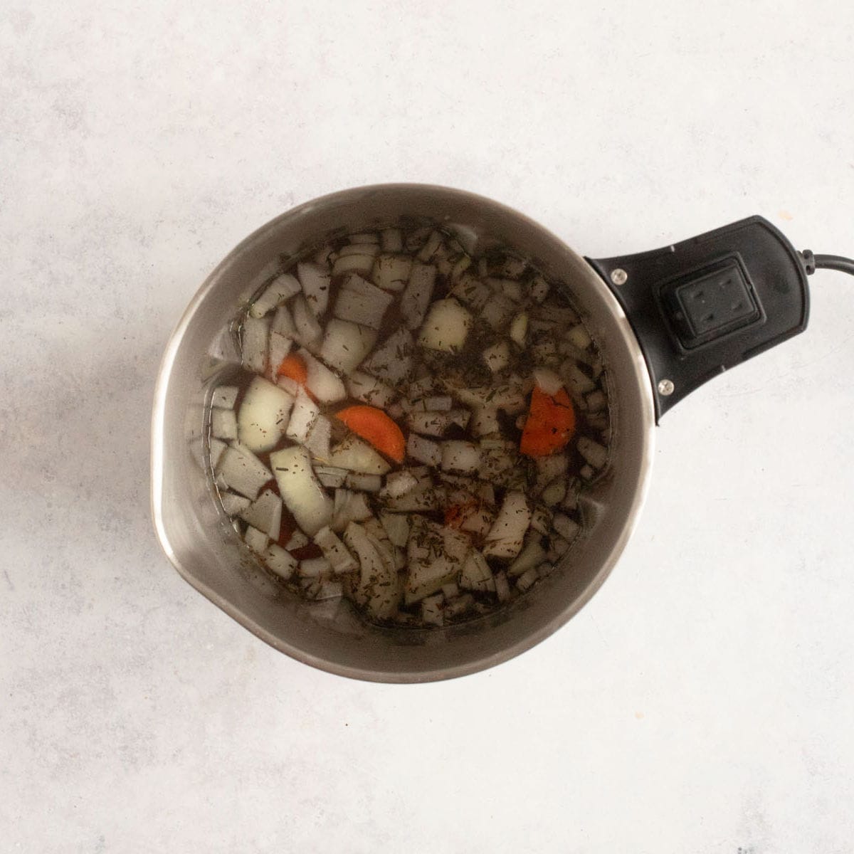 Ingredients for soup in soup maker.