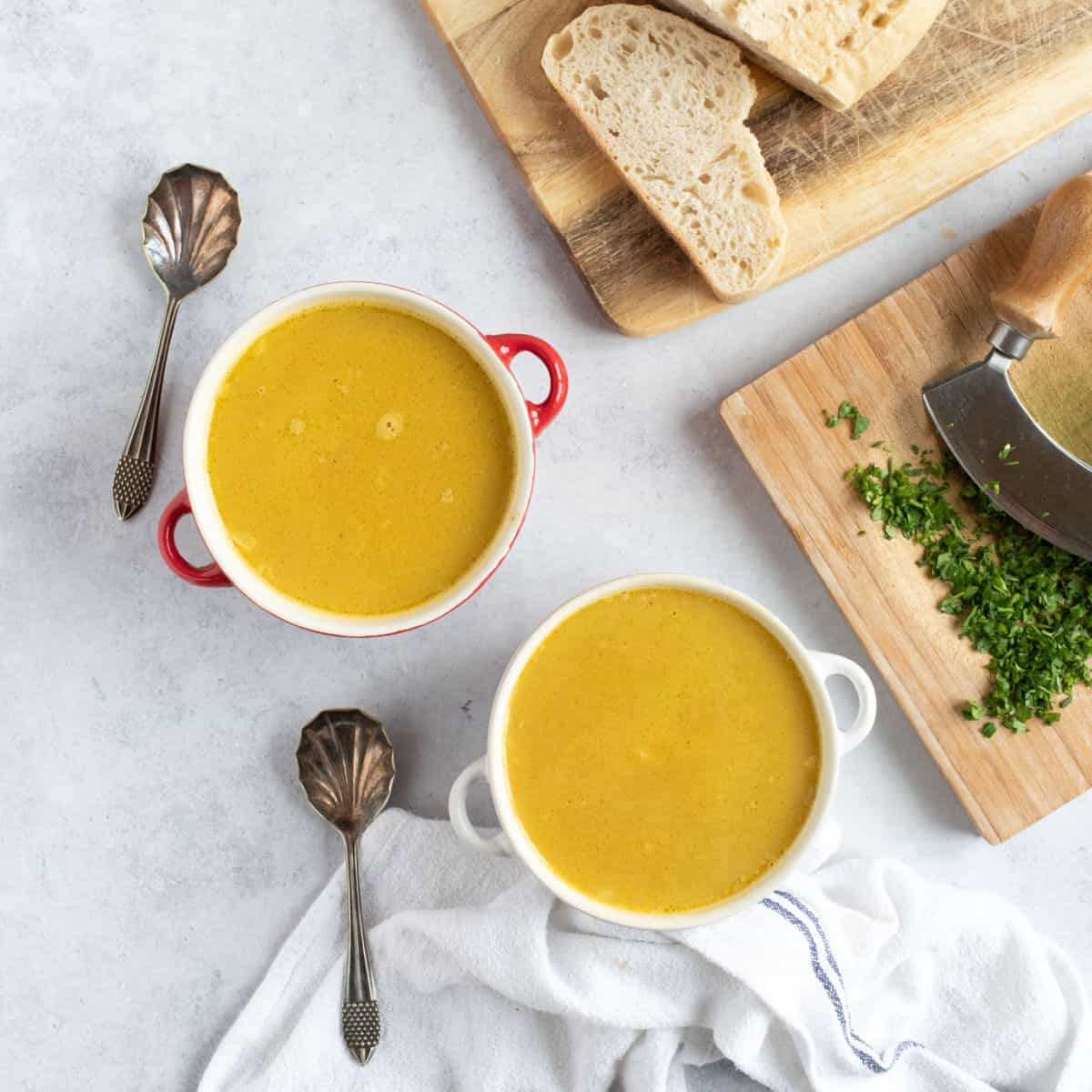 Two bowls of leftover chicken soup.