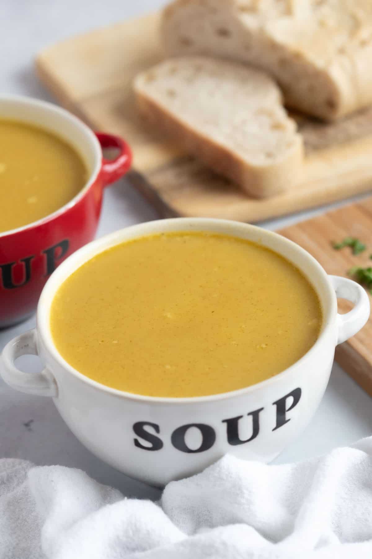 Bowls of leftover roast chicken soup.