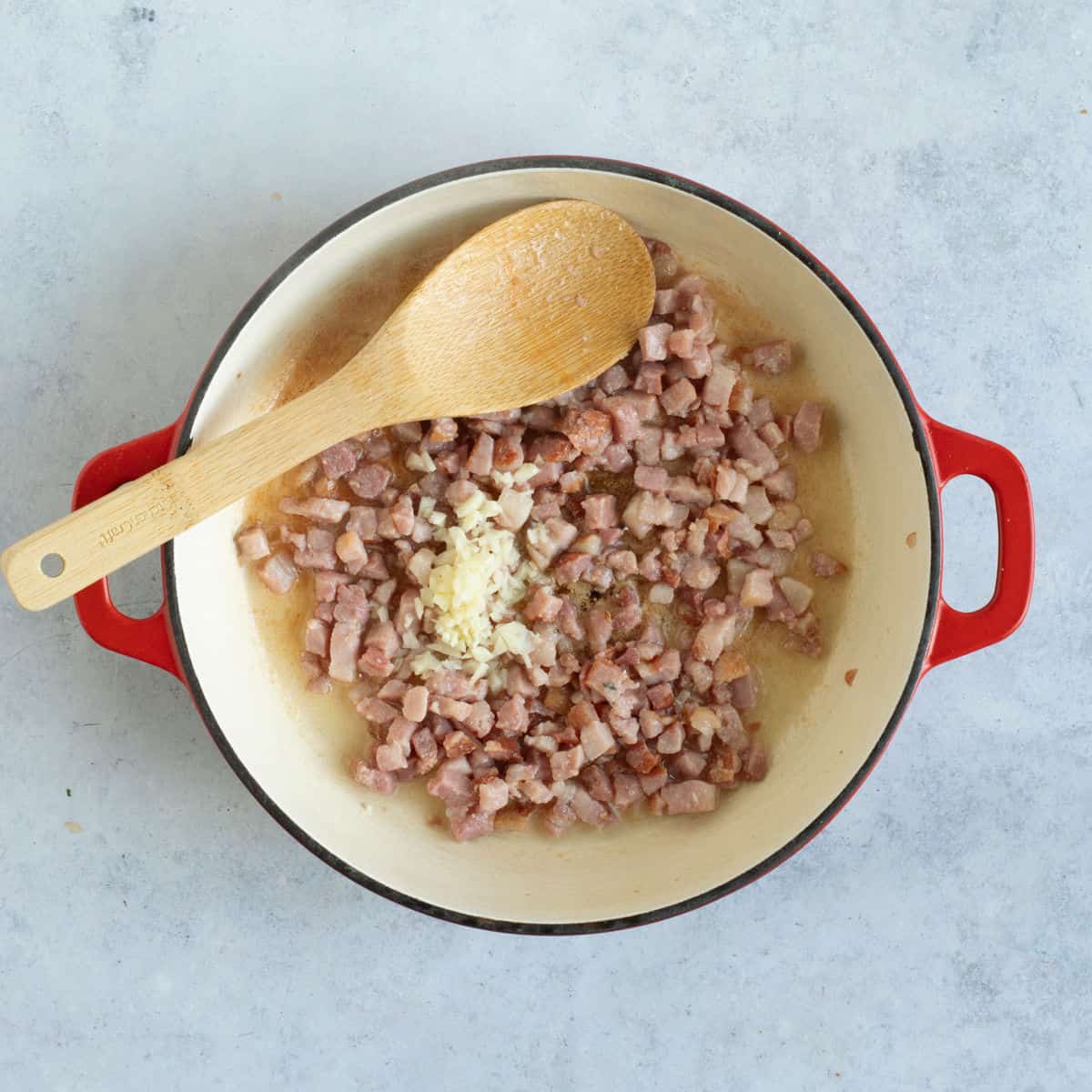 bacon and garlic in pan.