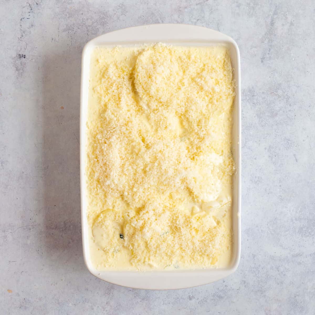 Layered potatoes in gratin dish.