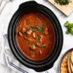 Slow cooker lamb curry in a slow cooker.