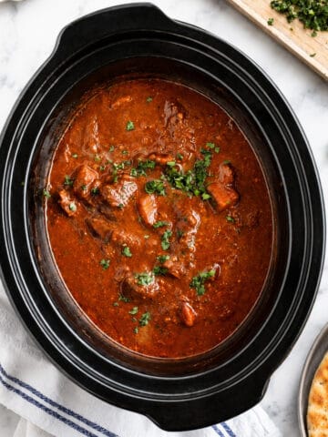 Slow cooker lamb curry in a slow cooker.