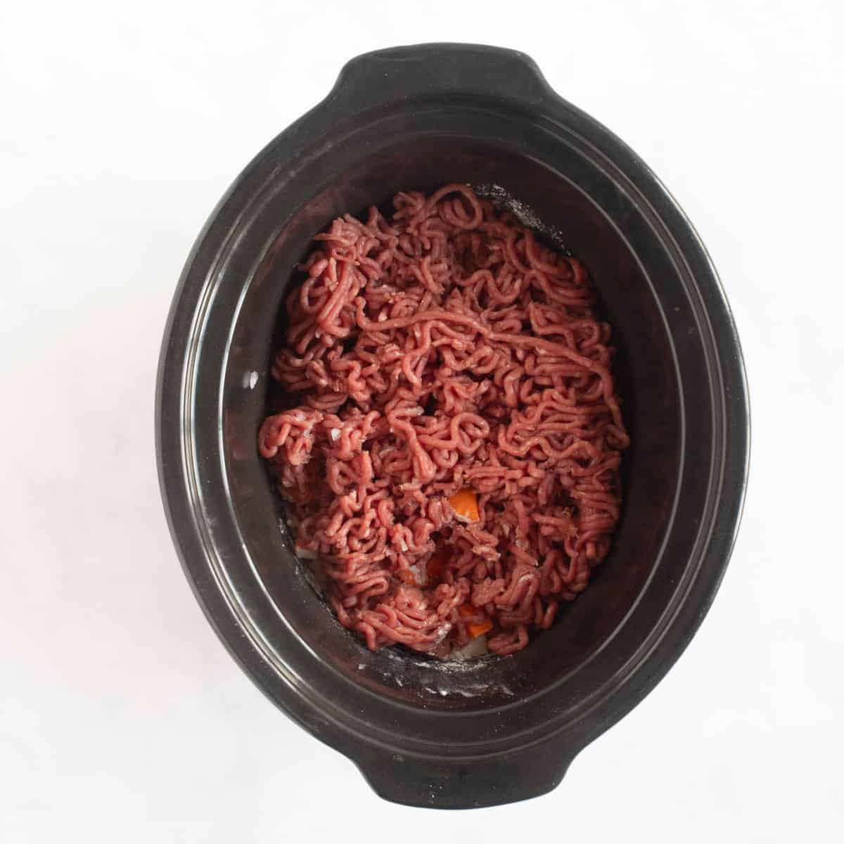 Raw mince in slow cooker.