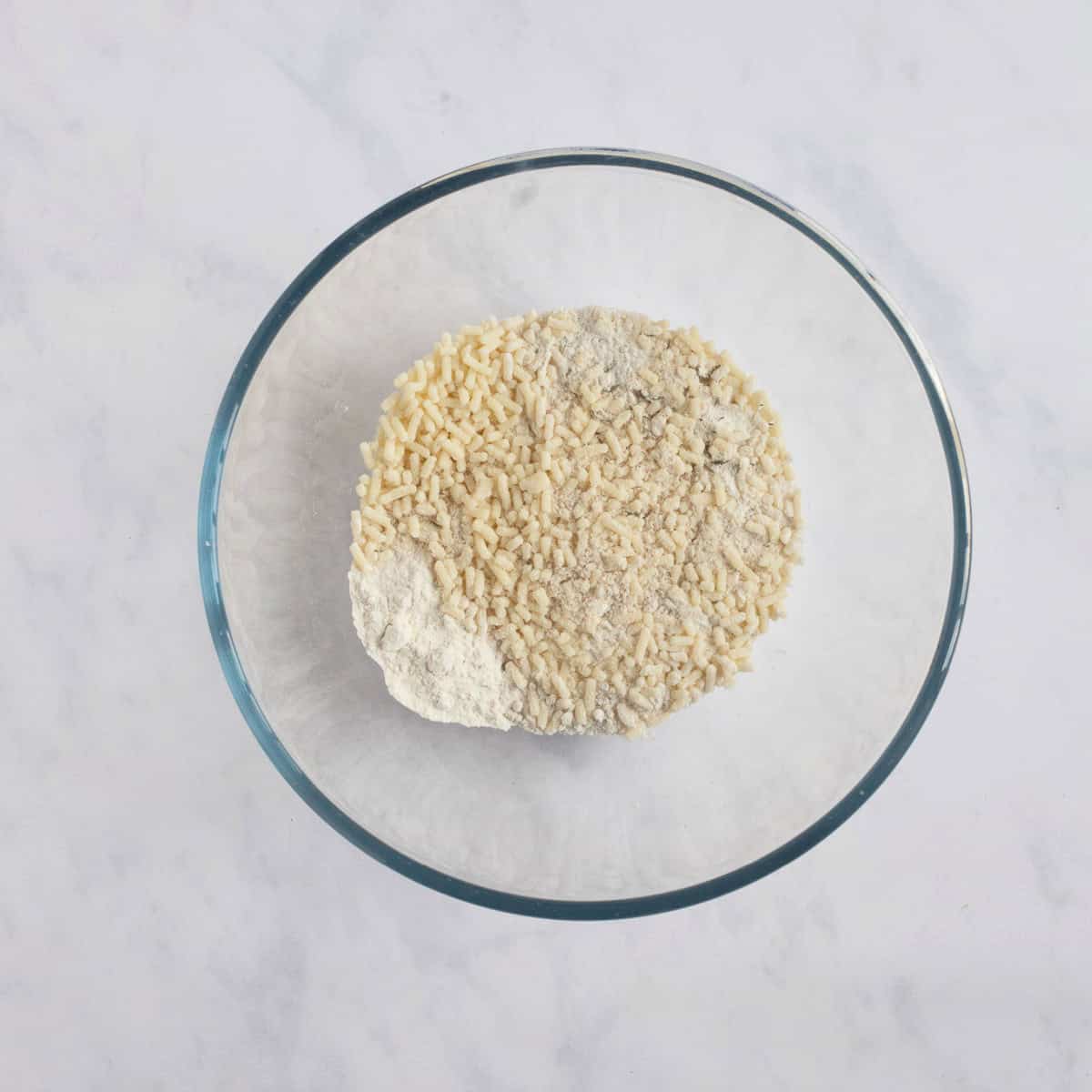 Flour and suet in a mixing bowl.