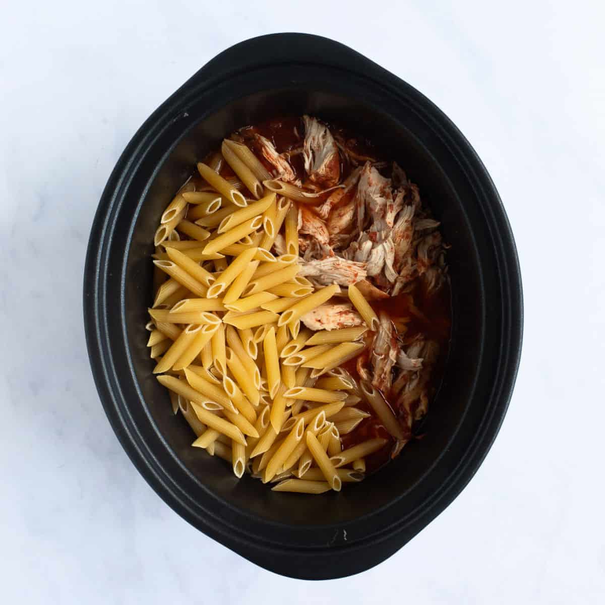Dried pasta in slow cooker.